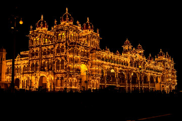 View of Mysore Palace iluminated at night, also known as Ambavilas Palace, Karnataka, India
