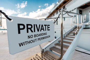 Private, no boarding without permission message message at the luxury yacht entrance