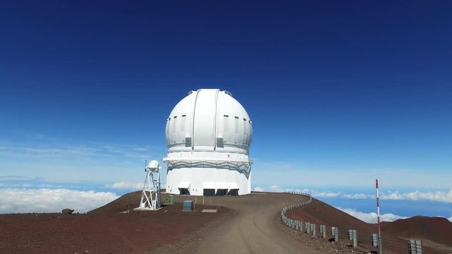 telescope observatory over the clouds - Mauna Kea, Hawaii 