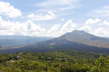 Fototapeta na wymiar View of the volcano of Batur on a clear sunny day in the north east of the island of Bali in Indonesia