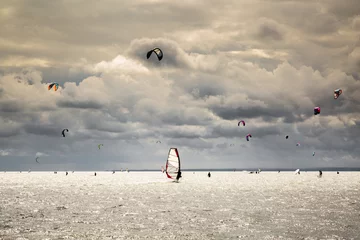 Foto op Plexiglas wind kiting and wind surfing on the ocean with wonderful clouds   Hel, Poland © vorkaPICTURE