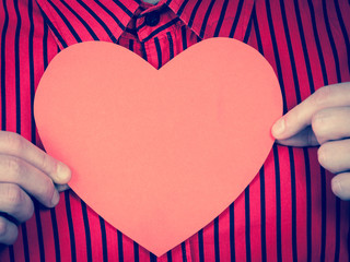 Man with beautiful red heart.