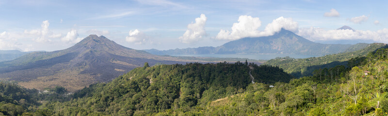 Fototapeta na wymiar Panoramic view of the mountain kintamani and two volcanoes, Agung and Batur on a sunny day