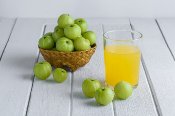 Indian gooseberry on wooden table