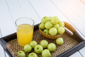 Indian gooseberry on wooden table