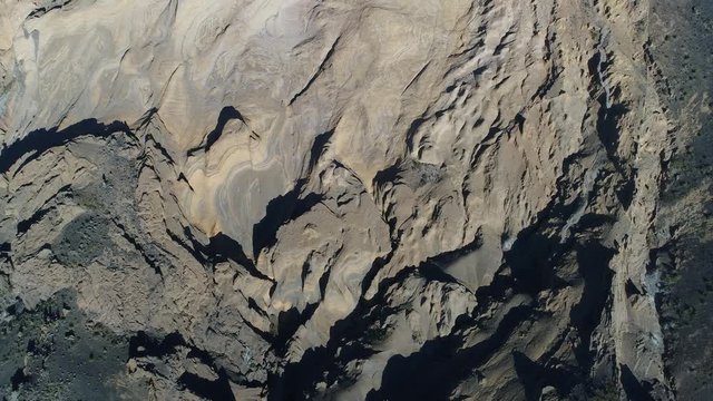 Aerial drone scene top view of Malacara volcano in Malargüe, mendoza, cuyo, Argentina. Camera moving forwards. Old touristic volcano in La Payunia National Park. hydromagmatic volcano.