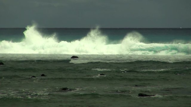 Still: A Huge Strong Waves Crashing the Small Stones