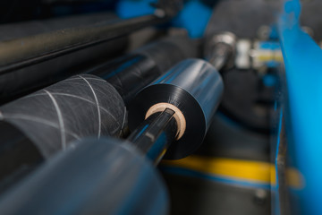 Ribbon slitter in a TTR wharehouse and production factory