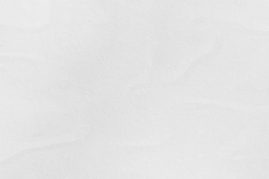 Texture of white crumpled paper background