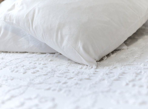 White pillows and Bedspread