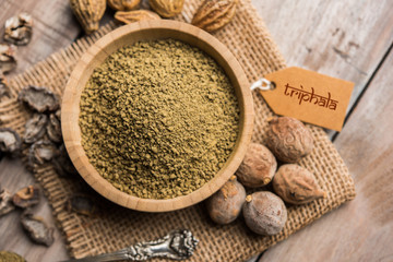 Indian ayurvedic Triphala churan or trifala powder is an ancient medicine for bowel movement or indigestion problems. Selective focus