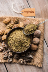 Indian ayurvedic Triphala churan or trifala powder is an ancient medicine for bowel movement or indigestion problems. Selective focus