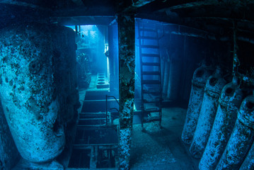An underwater shot inside a room in the shipwreck of the Kittiwake that uses natural light as...