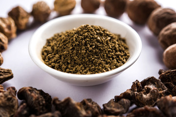 Indian ayurvedic Triphala churan or trifala powder is an ancient medicine for bowel movement or indigestion problems. Selective focus