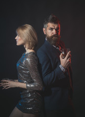 Tips for hosting safe holiday party. Man in suit and fancy lady at corporate party drinking. Celebration with alcohol concept. Man with beard and woman in dress office workers celebrating holiday