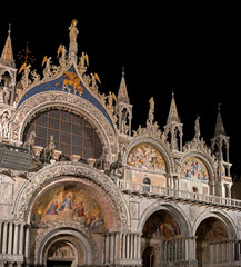 Fototapeta na wymiar Basilica di San Marco illuminated at night on Piazza San Marco. Italy.