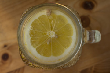 lemon lemonade. lemon in a glass of sparkling water. healthy lemonade