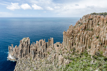 Elevated view of Cape Raoul with its impressive formation of dolerite columns. Tasman National Park, Tasmania, Australia.