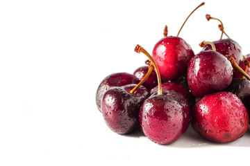 Fresh ripe cherries on white background. copy space