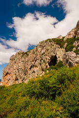 Fototapeta na wymiar old cave in a cliff