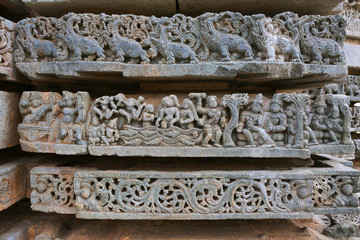 Ornate bas reliefs depicting scene from Mahabharata, Kedareshwara temple, Halebidu, Karnataka