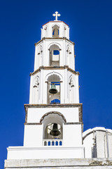 Fototapeta na wymiar Bell tower of the Greek Orthodox Church