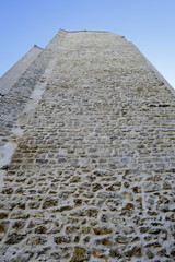 Fototapeta na wymiar Grand mur de pierre ancien