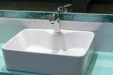 Sink in the Toilet. / The washbasin in modern bathroom.