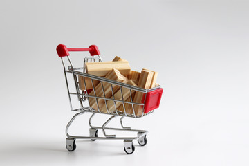 Shopping carts containing wooden blocks.