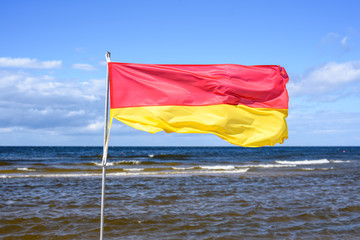 Red and yellow safe swimming area flag, Jurmala, Latvia