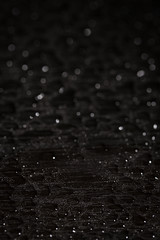 Water drops on black background. Abstract background.