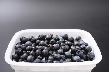 forest berry blueberry on a black background.