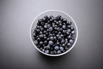 forest berry blueberry on a black background.