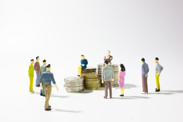 Business competition of miniature businessman.