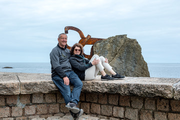 Man and woman enjoy vacation by the sea