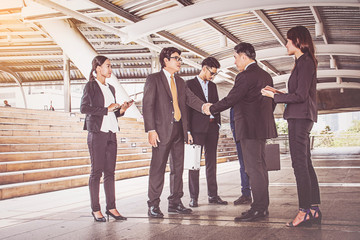 businesspeople group handshake at city, business team