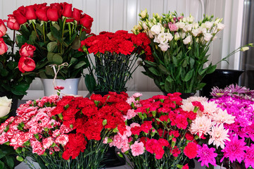 Fototapeta na wymiar Flower Shop Showcase. Flowers for sale.