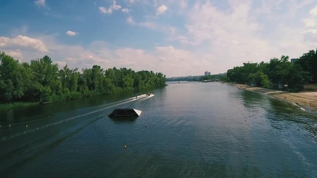 Water skiing on the river, aerial shooting