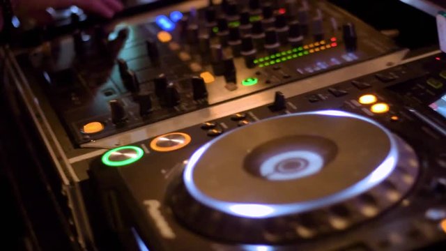 DJ equipment playing close up