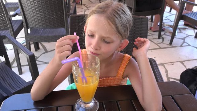 Child Drinking Orange Juice at Restaurant, Kid Portrait at Bar, Girl at Terrace