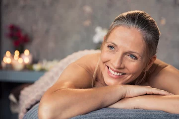 Fototapeten Mature woman smiling at spa © Rido