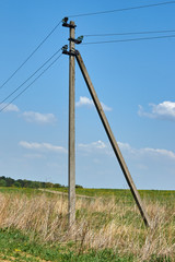 Fototapeta na wymiar column power lines on natural background