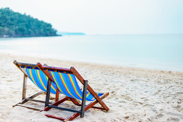 Colorful beach chair on the beach with beautiful Blue sky on sunny day, Relaxing in beach chairs.