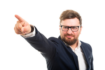 Portrait of business man showing get out gesture.