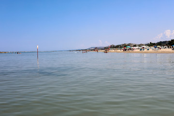 Fototapeta premium Beach of Roseto degli Abruzzi, Abruzzo, Italy. Roseto degli Abruzzi is also known as the 'Lido delle Rose' because of the great variety of roses and oleanders