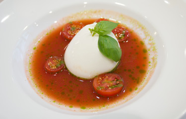 Version of Caprese salad with cherry tomatos