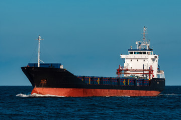 Fototapeta premium Black cargo ship