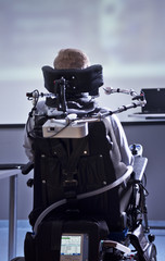 Disabled student in class room.