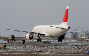 Passenger jet moving on the runaway