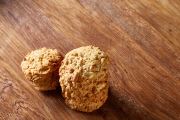 Bunch of chocolate biscuits on a rustic wooden background, close-up, selective focus.